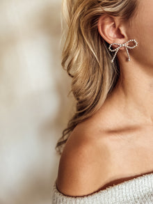 Les boucles d'oreilles Katie nœud
