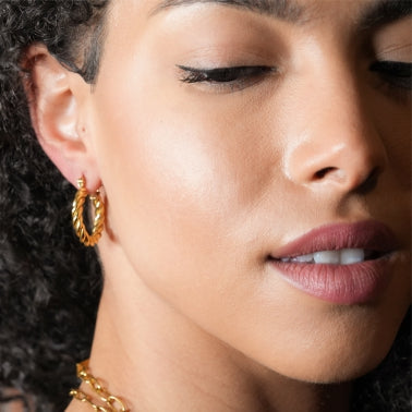 Boucles d'oreilles créoles dorées torsadées DAVANIA