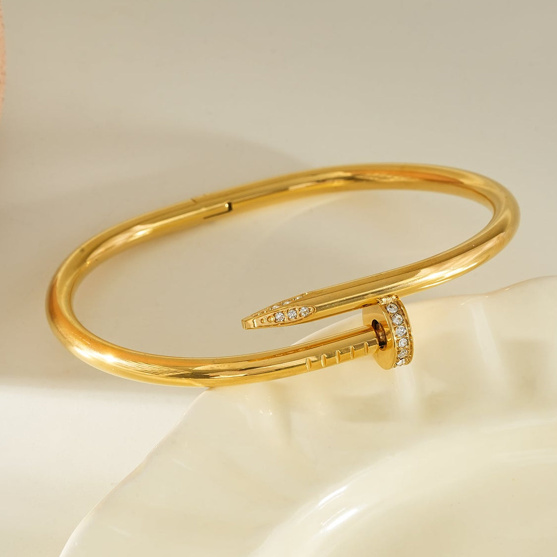 DAVIDKA Gold: Zirconia Embedded Industrial-Chic Twisted Nail Bracelet