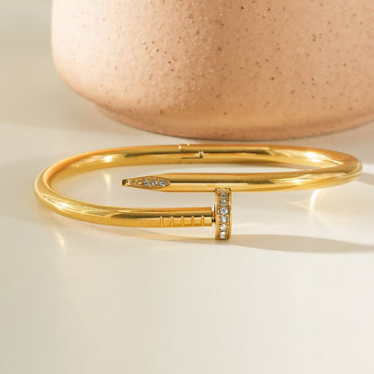 DAVIDKA Gold: Zirconia Embedded Industrial-Chic Twisted Nail Bracelet