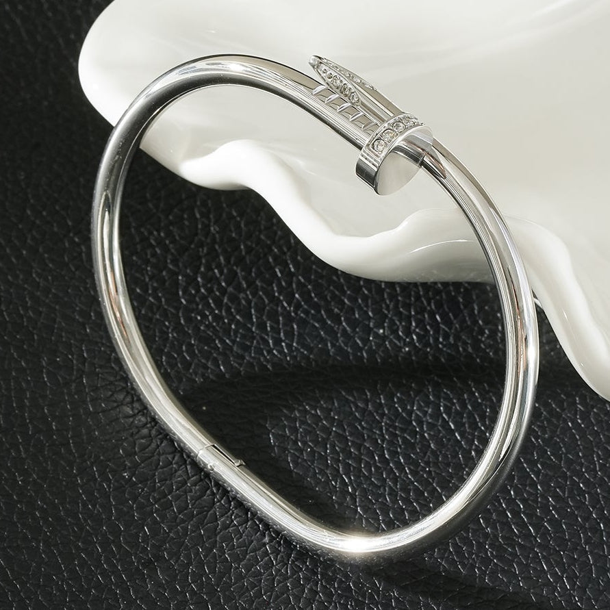 DAVIDKA Silver (White Gold): Zirconia Embedded Industrial-Chic Twisted Nail Bracelet