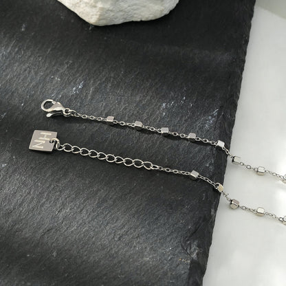 DEMELZA Or Blanc (Ton Argenté) : Bracelet Essentiel Quotidien avec Perles Carrées Délicates