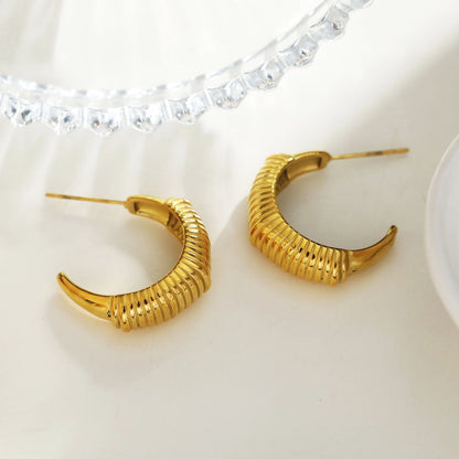 Style DOLCEDA : Boucles d'oreilles créoles géométriques de style Art Déco