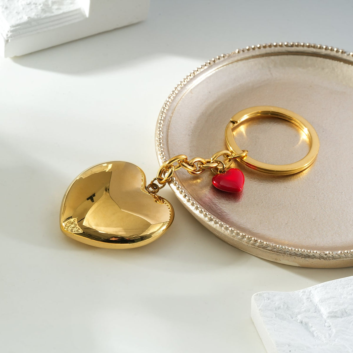 AKAMAI Gold: Golden Heart Charm Key Ring with Red Enamel Accent