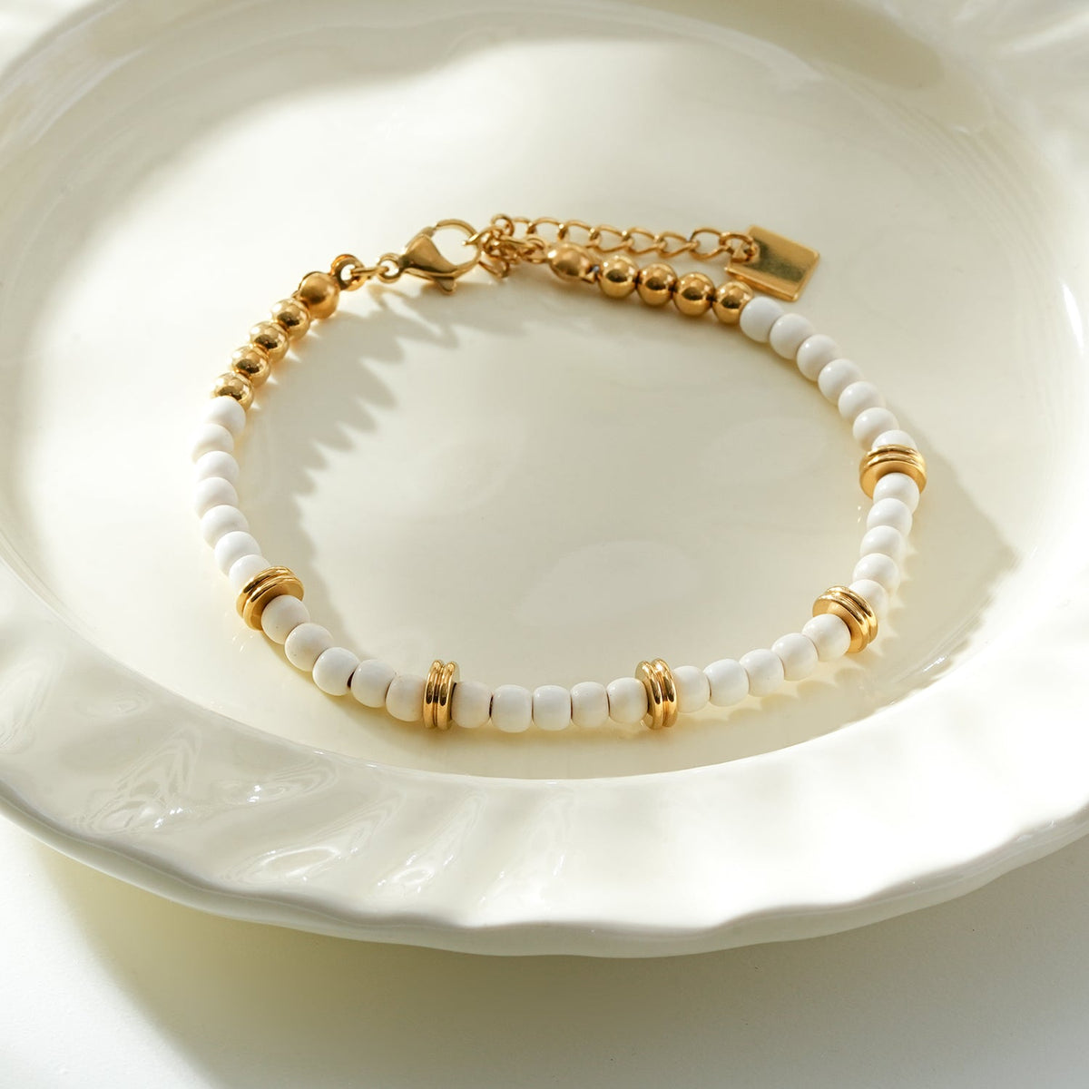 JAMILAH Gold: White Turquoise Stones and Gold Beaded Bracelet.