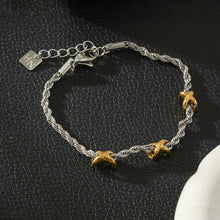 DRAGOSA Métaux Mixtes : Bracelet chaîne corde en argent avec breloques triples mini croix en or