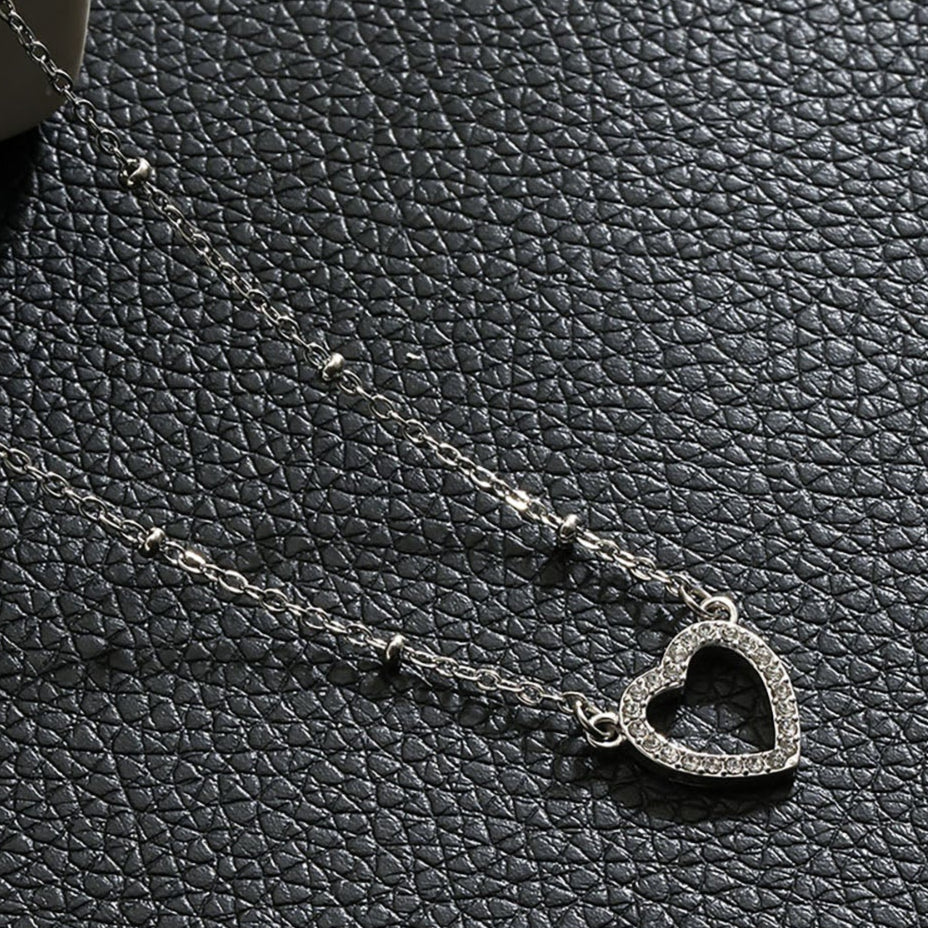 CHERISH Argent (Or blanc) : Chaîne perlée retenant un élégant pendentif cœur pavé