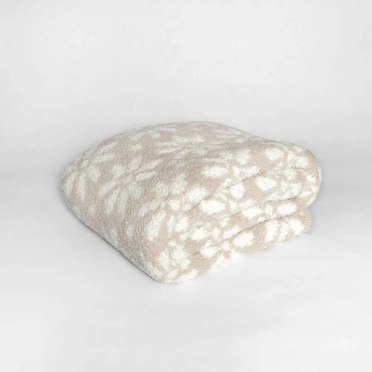 Jeté de lit allongé blanc et beige rougissant à motif marguerite