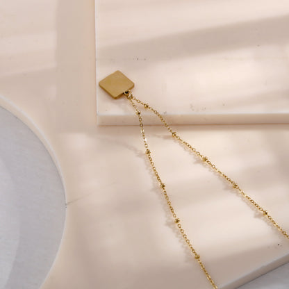 Collier pendentif carré ELU minimaliste en métal et coquille