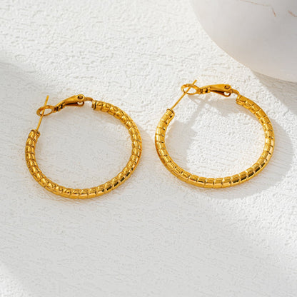 Style ETSUKO : Boucles d'oreilles créoles avec motif roseau sculpté
