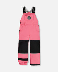 Salopette de ski rose bonbon