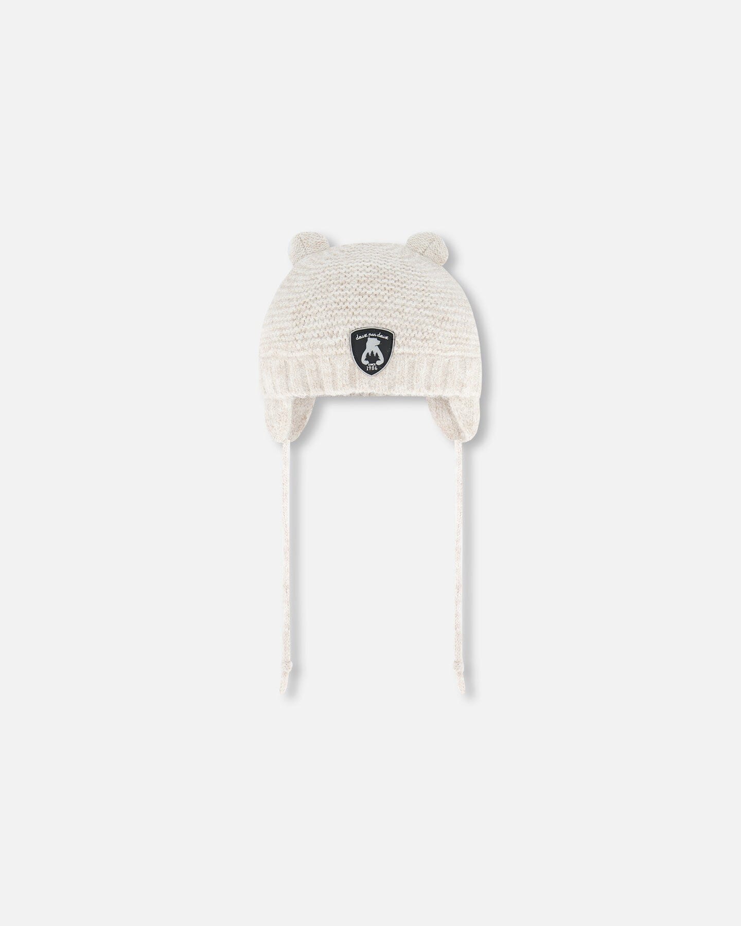 Bonnet tricoté avec oreilles blanc cassé