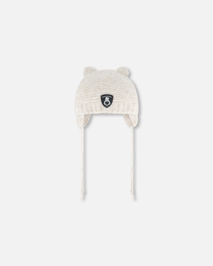Bonnet tricoté avec oreilles blanc cassé
