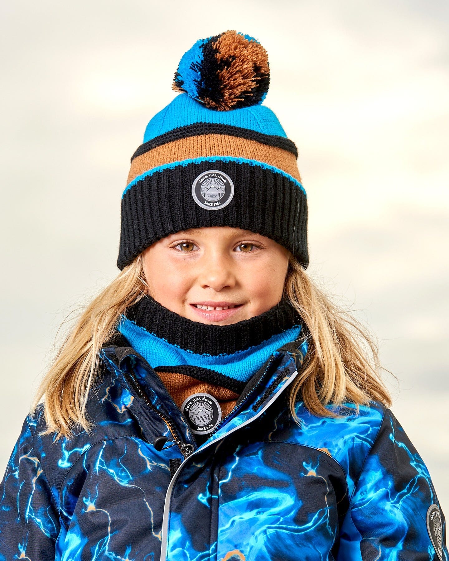 Bonnet en maille bleu, noir et cannelle
