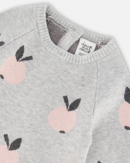 Combinaison tricotée en jacquard grise avec des pommes