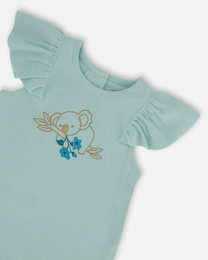 Barboteuse en coton bio à volants bleu clair