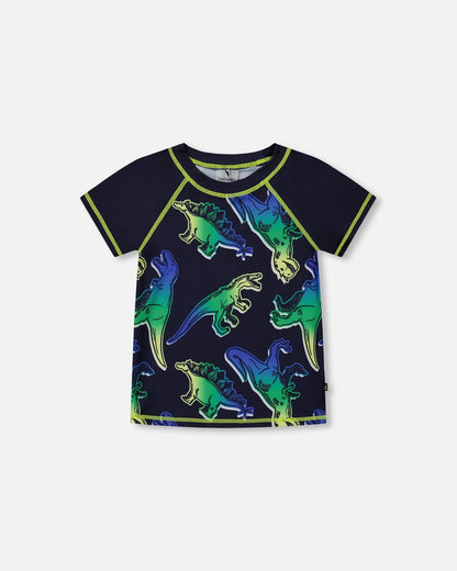 Haut anti-UV manches courtes dinosaures bleus et verts sur fond marine