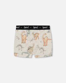 Short imprimé en coton biologique, motif dinosaure sur fond tacheté et havane