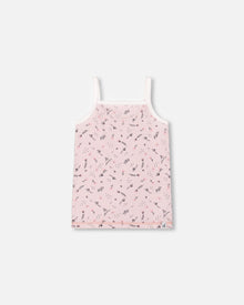 Débardeur en coton biologique imprimé petites fleurs roses sur fond rose pâle