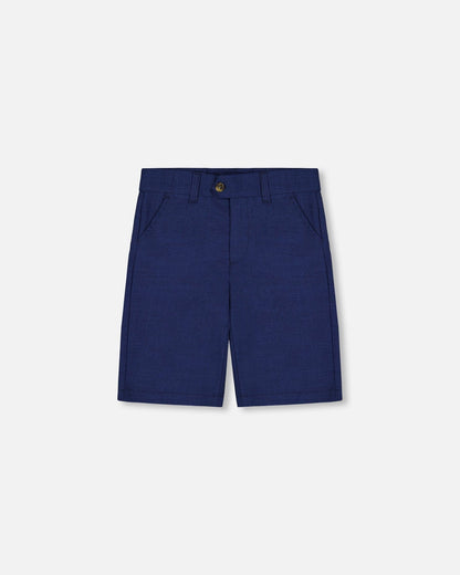 Short ample à poches obliques bleu marine
