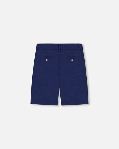Short ample à poches obliques bleu marine