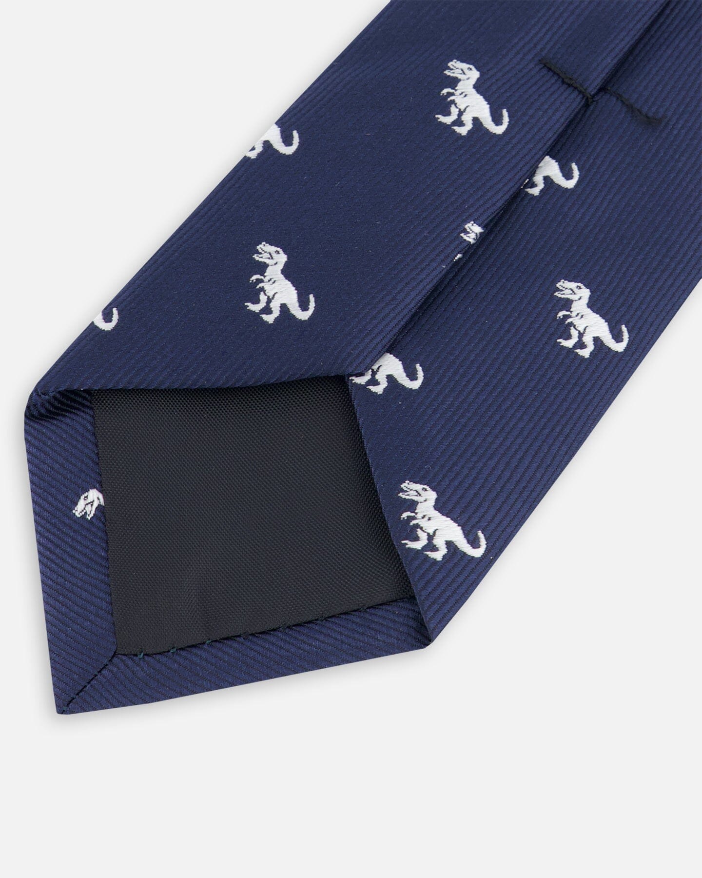 Cravate bleu marine et dinosaure
