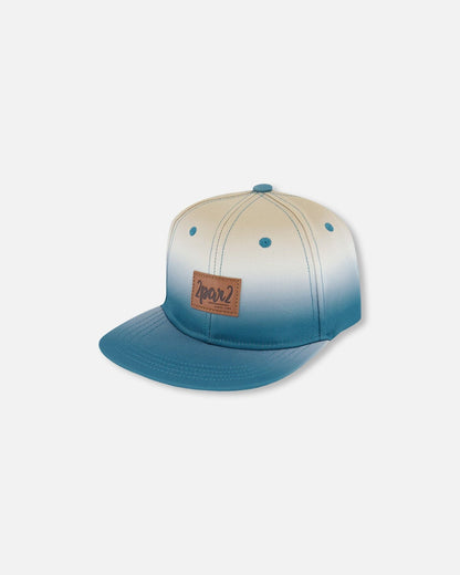 Casquette imprimée gris bleuté et beige