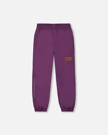 Pantalon imperméable violet