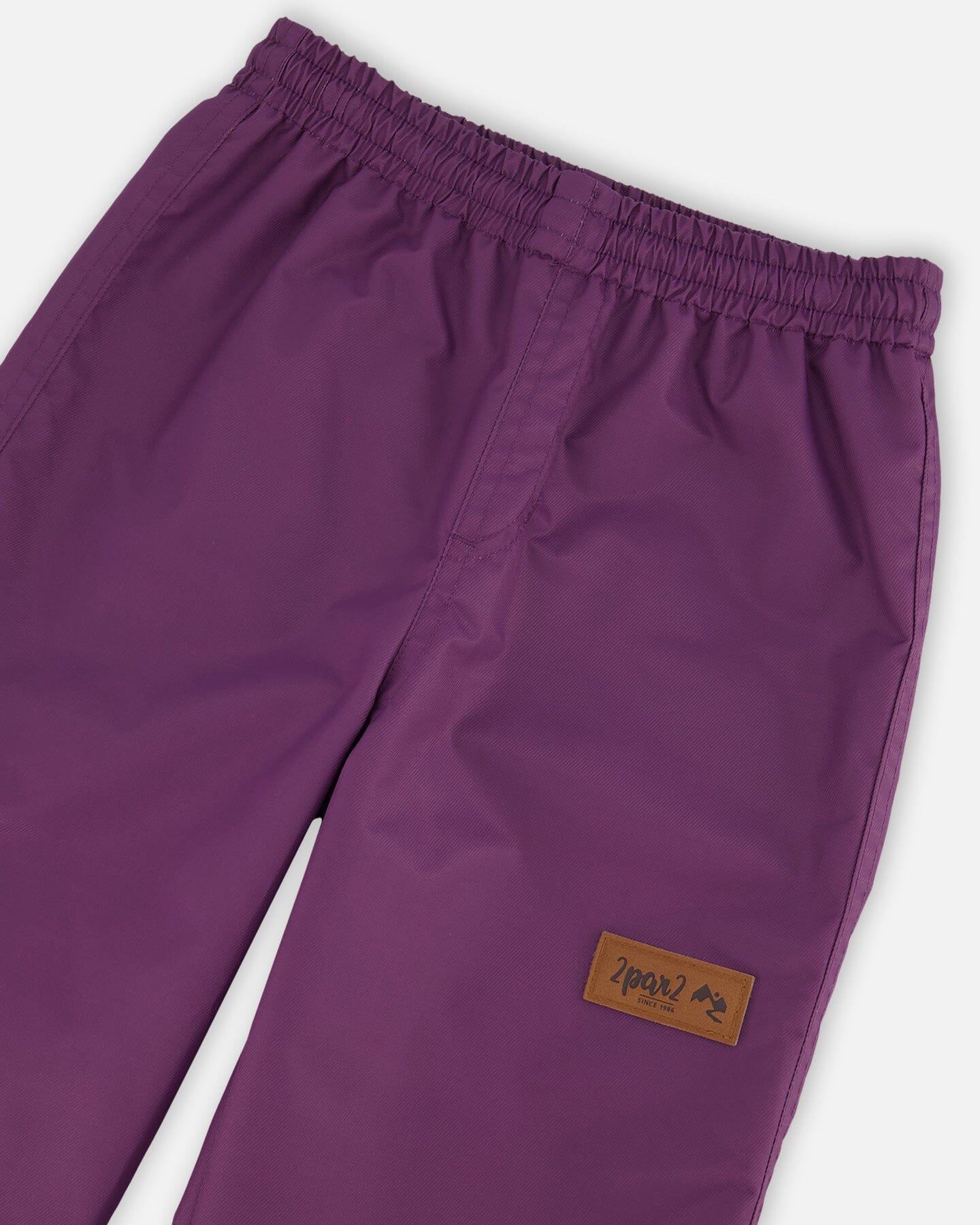 Pantalon imperméable violet