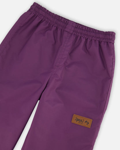 Pantalon imperméable violet