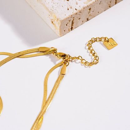 GINTA : Collier doré à 2 niveaux texturé peau de serpent