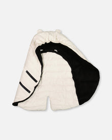 Couverture bébé Snugly conçue pour les sièges auto et les poussettes, blanc cassé