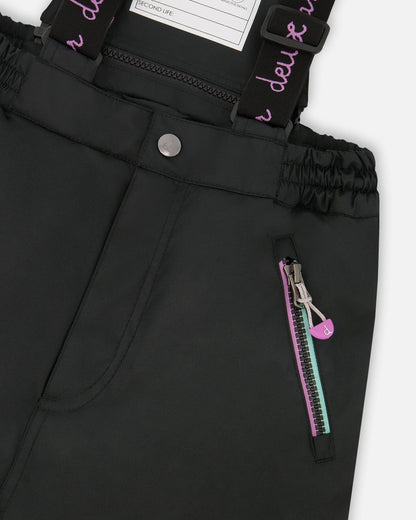 Ensemble de ski deux pièces noir avec imprimé multicolore