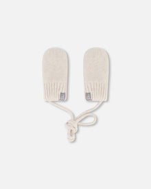 Mouffles en tricot écru pour bébés