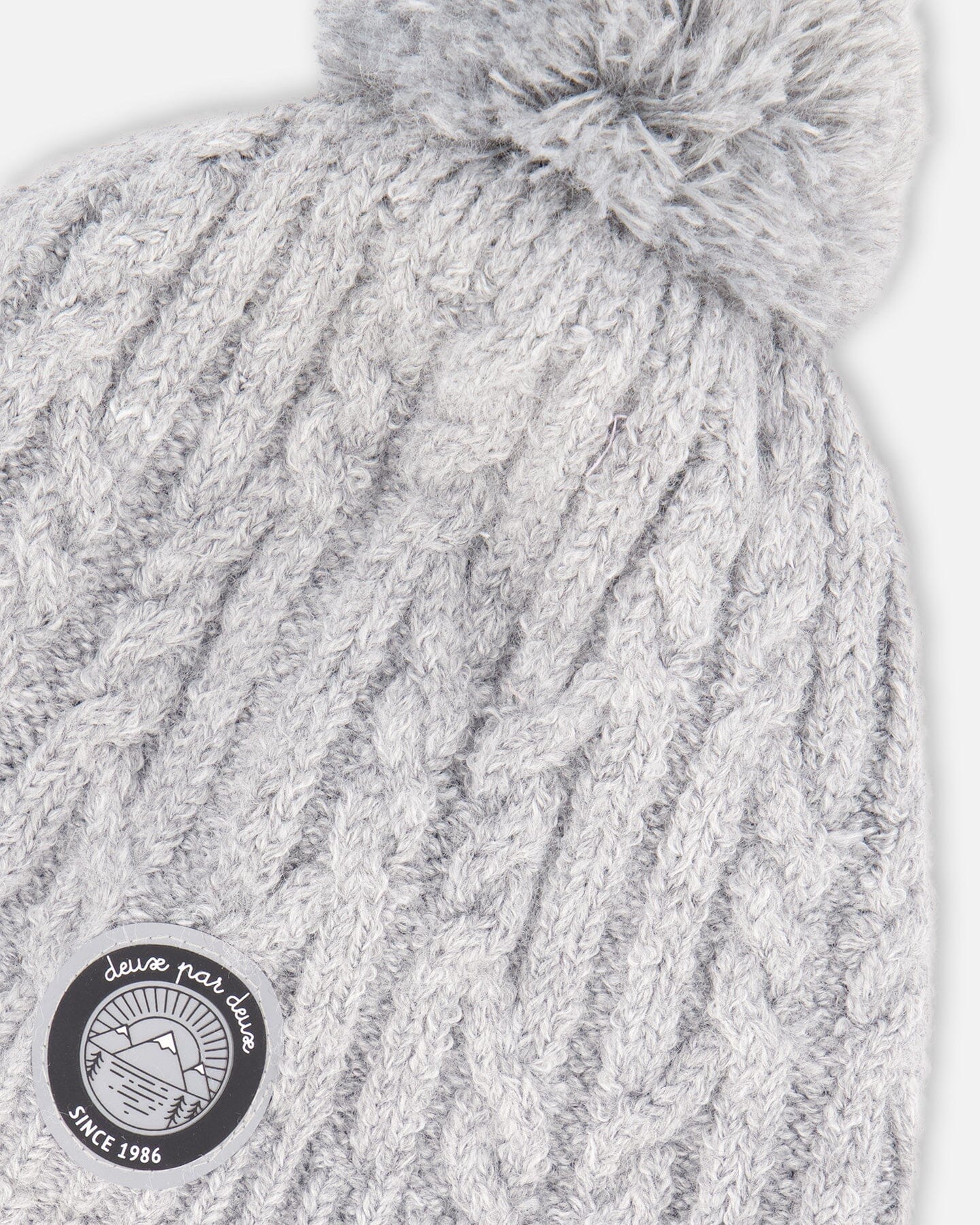 Bonnet d'hiver doublé avec pompon gris chiné