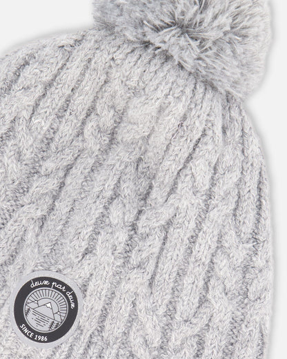 Bonnet d'hiver doublé avec pompon gris chiné