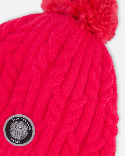 Bonnet d'hiver doublé avec pompon corail flash