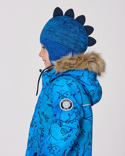 Bonnet péruvien tricoté doublé motif dinosaure avec pompon bleu