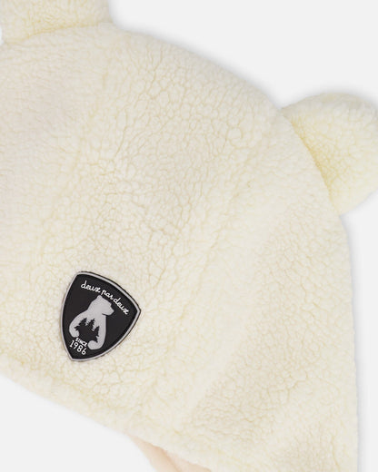 Bonnet bébé Sherpa doublé avec cache-oreilles écru