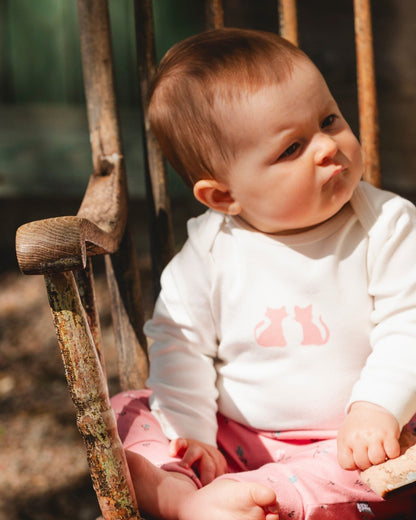 Pantalon évolutif en coton biologique rose fleuri