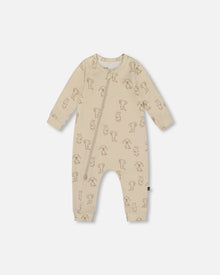 Grenouillère zippée en coton bio motif chiot beige