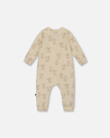 Grenouillère zippée en coton bio motif chiot beige