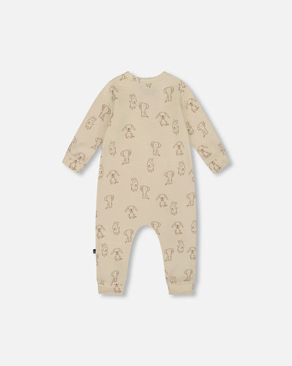 Grenouillère zippée en coton bio motif chiot beige