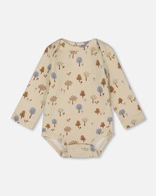 Grenouillère en coton bio imprimé arbre beige