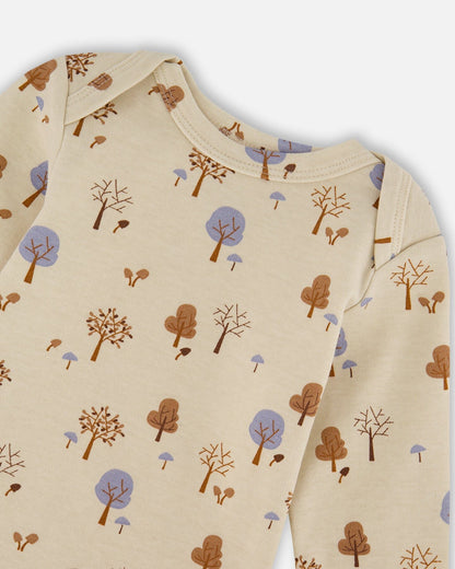 Grenouillère en coton bio imprimé arbre beige