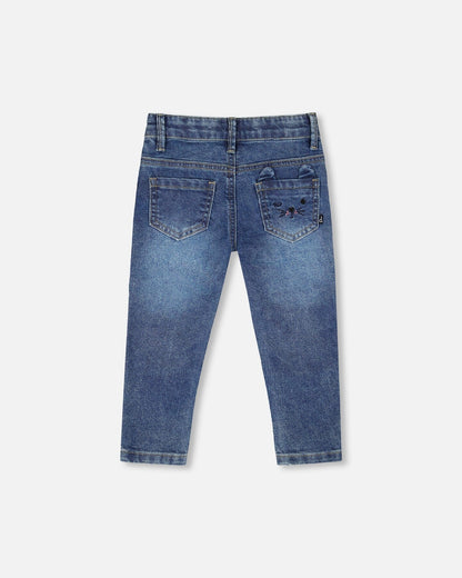 Jean en denim bleu avec broderies