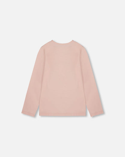 T-shirt manches longues en coton biologique rose clair à grandes fleurs