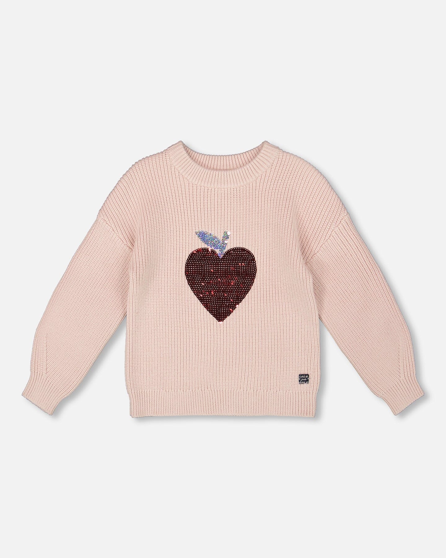 Pull en maille blanc rosé avec cœur à paillettes