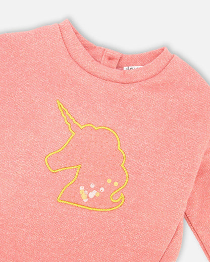 Robe bi-matière rose poudré avec jupe en résille et licorne