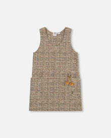 Pull en tweed beige et noir